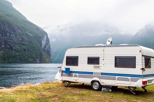 Caravan by lake